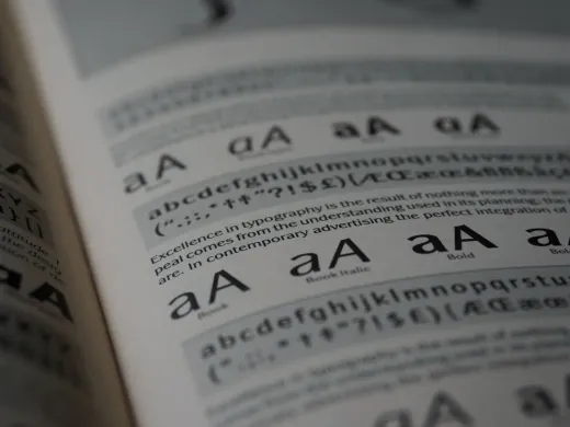 An open book showing a typeface specimen page